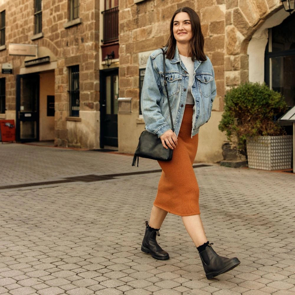 A women wearing blundstone chisel toe boots