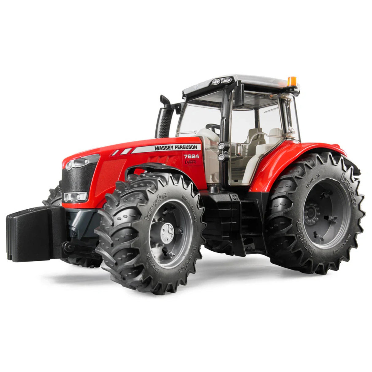 A close-up view of Bruder Massey Ferguson tractor toy on a white background