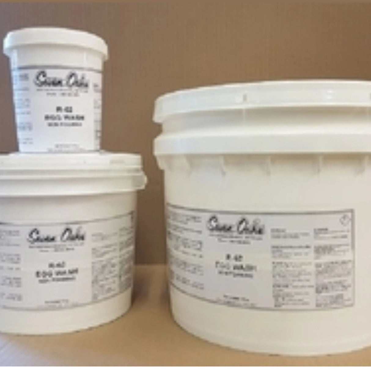 Tubs of Seven Oaks Chicken Supplies Non-Foaming Egg Wash 500g on a floor
