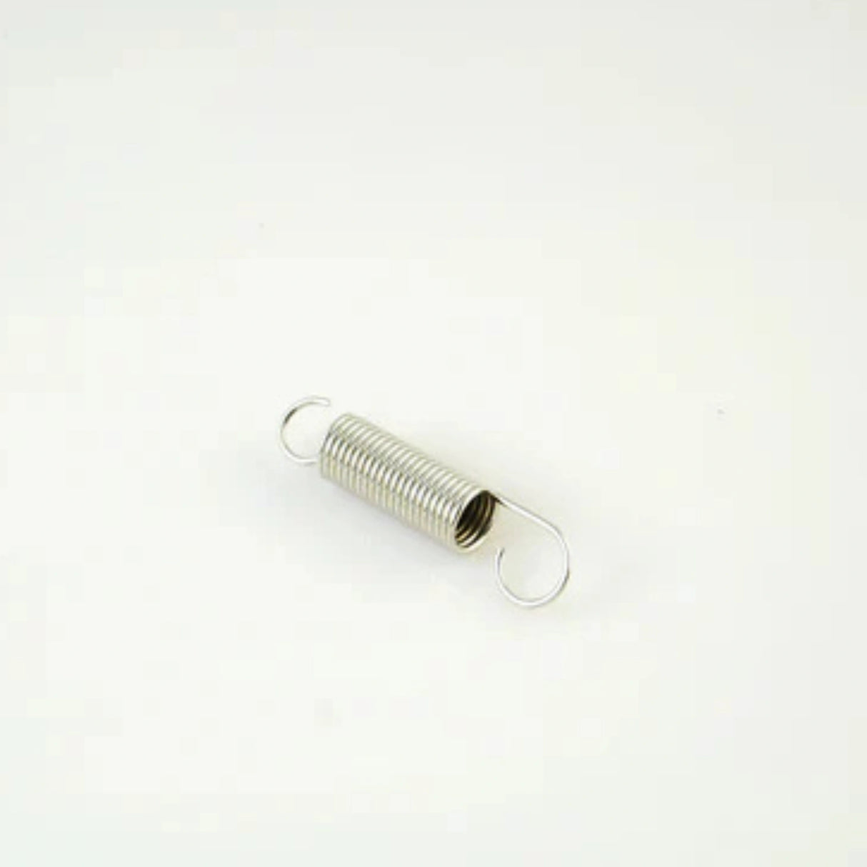 Front view of Corona replacement wire spring on a white background