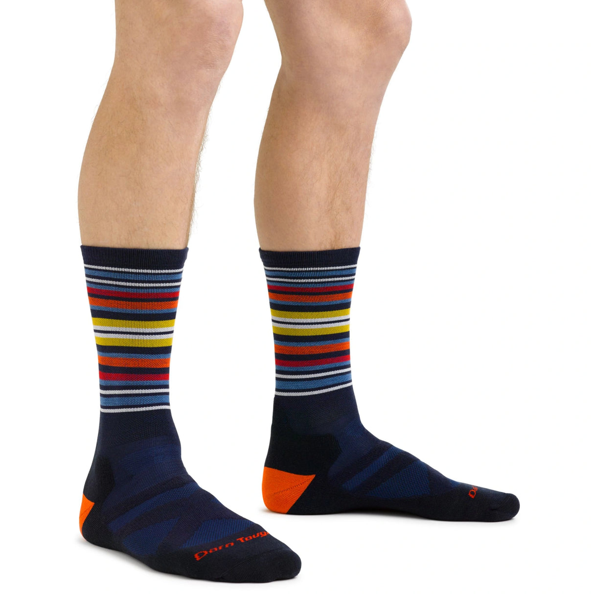 Darn Tough Men's Oslo Nordic Boot Lightweight Ski and Snowboard Socks being worn on a white background