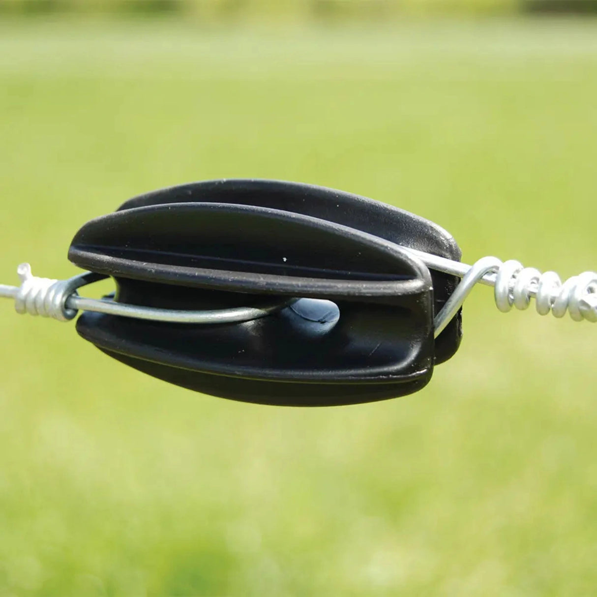 Patriot Electric Fence Insulators End Strain in use on a fence