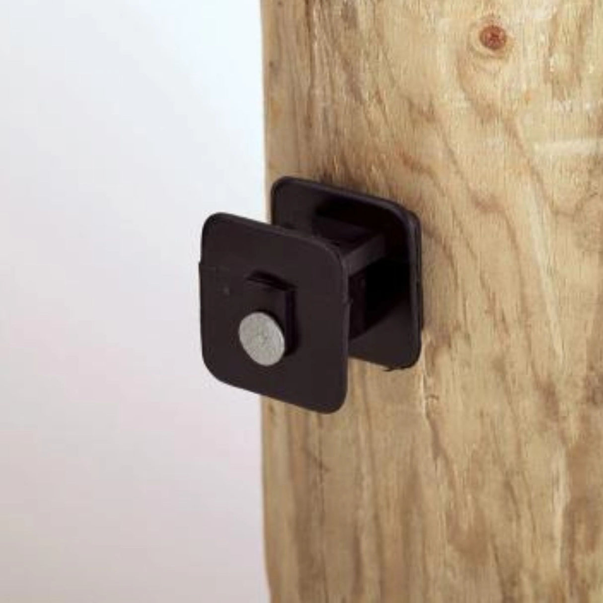 Dare Electric Fence Insulators Wood Post Black Widow installed on a wooden post