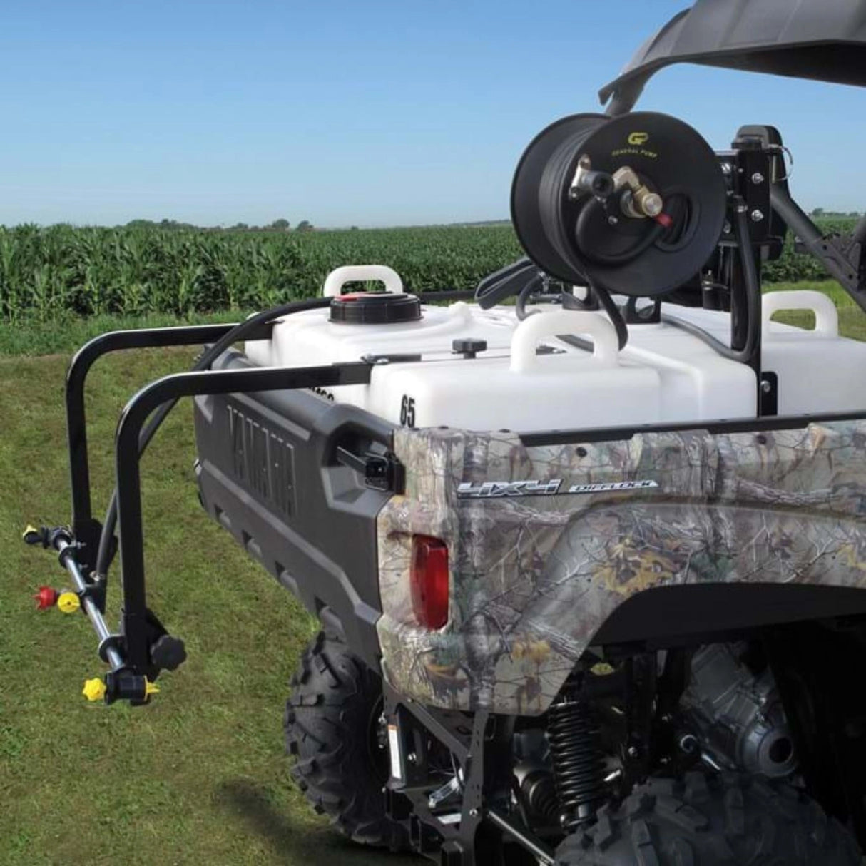 A man using 3/8" 50 ft. Hose for 45/65 UTV Sprayer Hose Reel Attachment in the outdoors, Kamloops, British Columbia