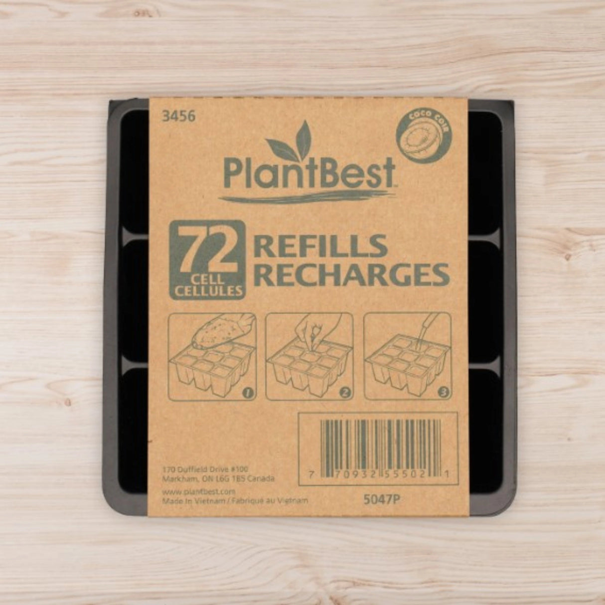 Close-up view of Plant Best 72-Cell Refill Plastic Greenhouse on a wooden background