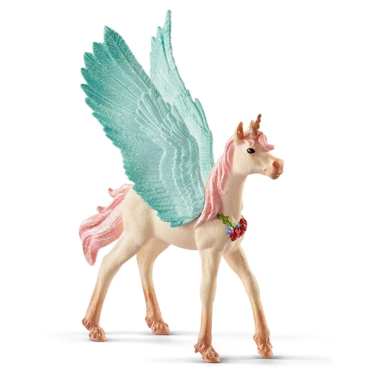 Close-up view of Schleich Bayala decorated unicorn Pegasus foal toy on a white background