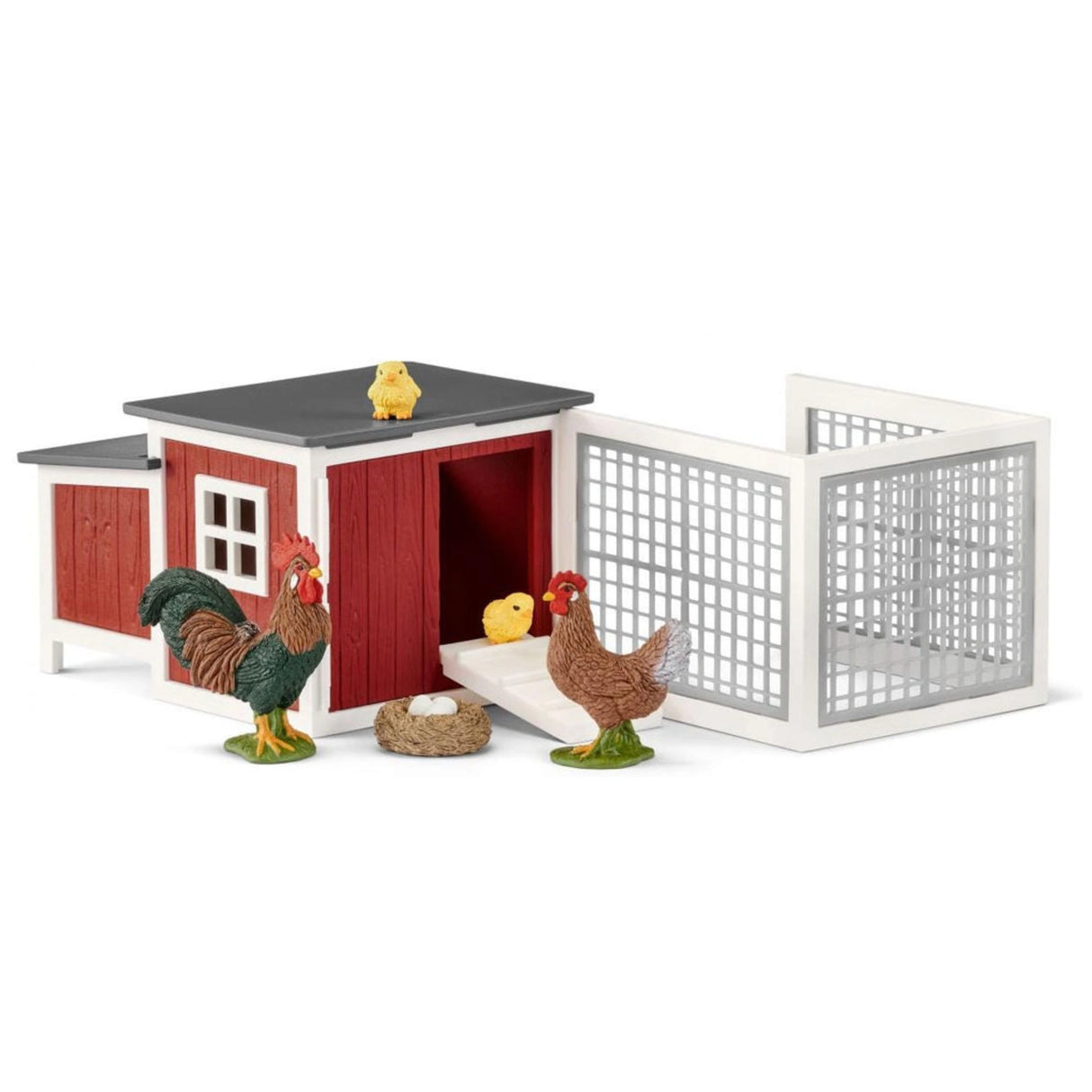 A close-up view of Schleich chicken coop farm animal toys on a white background