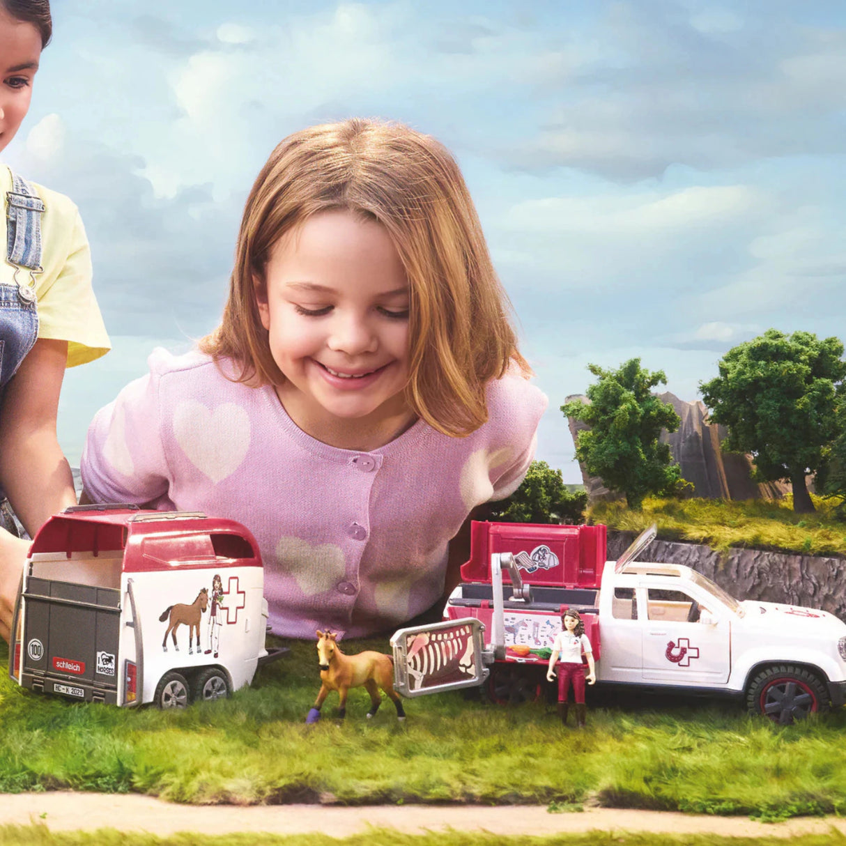 Children playing indoors with Schleich Mobile Vet with Trailer horse toy set
