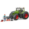A close-up view of Bruder Fendt tractor toy with repair accessories on a white background