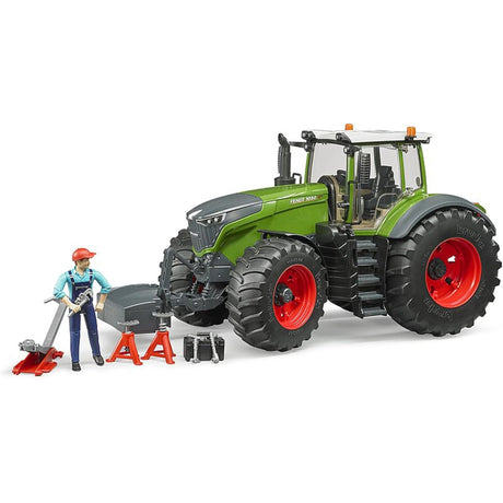 A close-up view of Bruder Fendt tractor toy with repair accessories on a white background
