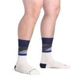 Darn Tough Men's Lillehammer Nordic Boot Lightweight Ski and Snowboard Socks being worn on a white background