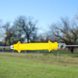 Patriot Electric Fencing Rubber Gate Handle in use with polywire fencing, in the outdoors of Kamloops, British Colombia