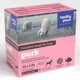 Front view of Healthy Paws Canine Complete Pork Dog Food on a white background