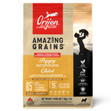Front view of Orijen Amazing Grains Puppy Dog Food on a white background