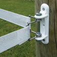 Patriot White Wide Tape Corner End Strain Insulator installed on a wooden fence post in the outdoors of Kamloops, British Columbia
