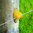 Patriot Electric Fence Insulators Wood Post Claw in use with poliwire on a wooden fence