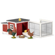 A close-up view of Schleich chicken coop farm animal toys on a white background