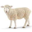 A close-up view of Schleich Farm Animal Toy white sheep on a white background