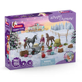 A close-up of the Schleich Horse Club Holiday Foal Magic horse toy on a white background