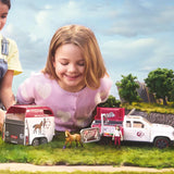 Children playing indoors with Schleich Mobile Vet with Trailer horse toy set
