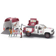 A close-up view of Schleich Horse Toy Mobile Vet with Trailer on a white background