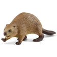 A close-up view of Schleich wild animal toy beaver on a white background