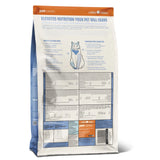 Back part of a bag of Summit Chicken Meal + Turkey Meal cat food on a white background showing nutritional information
